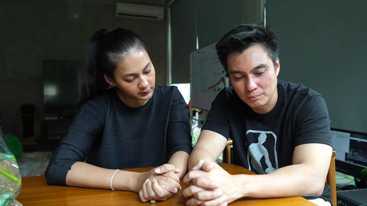 Careless prank: Baim Wong (right) and wife Paula Verhoeven apologize for their domestic violence prank in an Instagram video on Oct. 3. (Instagram/Baim Wong @baimwong)