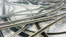 Vehicles move along a highway in Louisville, Kentucky, under freezing temperatures on December 23, 2022. Nearly a million-and-a-half US power customers were in the dark Friday as a severe winter storm walloped the country, causing highway closures and thousands of flight cancellations days before Christmas. Heavy snow, howling winds, and air so frigid it instantly turned boiling water into ice took hold of much of the nation, including normally temperate southern states.

