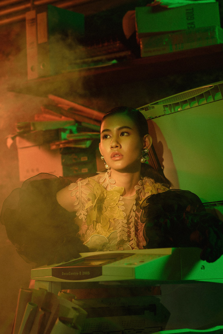 Copy the light: Netflix commissioned Prabowo “Bowo“ Prajogio to capture photos of the cast of the 2021 Indonesian feature film “Photocopier,“ starring Shenina Cinnamon (pictured). The photos are notable for its use of green-hued lighting. (Courtesy of Prabowo Prajogio)