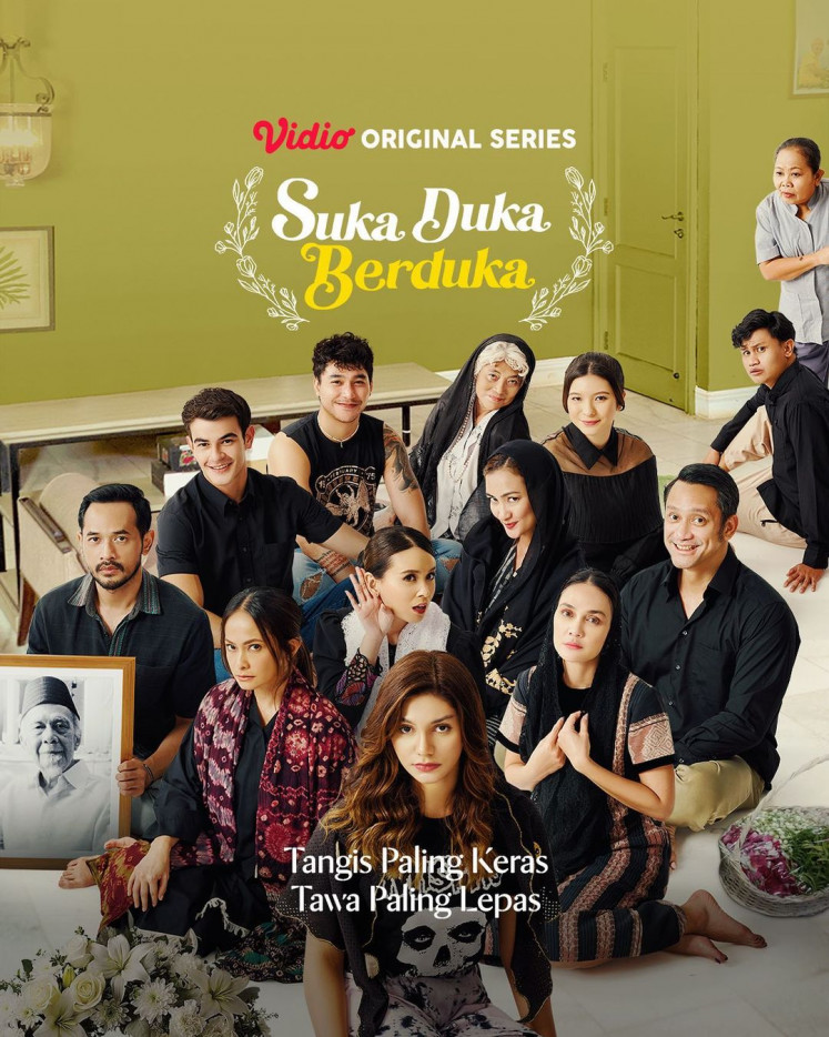 Family business: The poster for Indonesian web series 'Suka Duka Berduka' shows the family members of the late Opa Rauf, including his household assistant. (Instagram/Suka Duka Berduka)