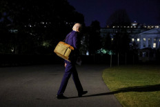 US President Joe Biden walks to board Marine One on the South Lawn on December 27, 2022 in Washington, DC. The Bidens are spending the New Years holiday in St. Croix, United States Virgin Islands. 