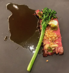 Texture, tenderness and taste in balance: The MB9 beef bolar blade is served with grilled broccolini, pickled mushrooms, caramelized onions, brioche crumbs and beef jus. (JP/Tunggul Wirajuda)