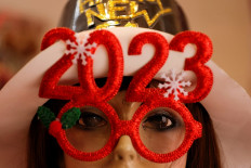 A mannequin decorated for the Christmas and New Year season is seen at a textile shop in Jakarta on Dec. 12.
