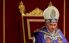 In this file photo taken on December 01, 2012 Pope Benedict XVI leads the Vesper prayer with members of Rome's universities at St Peter's Basilica at the Vatican.