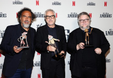 Best pals: Alejandro G. Iñárritu (left), Alfonso Cuarón (center) and Guillermo del Toro (right) attend The Three Amigos In Conversation presented by Netflix at Academy Museum of Motion Pictures on Friday in Los Angeles, California, United States.