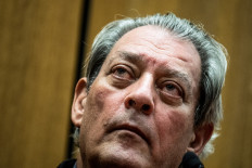 Novelist Paul Auster addresses US gun violence in new book 