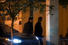 Former Brazilian President Jair Bolsonaro (right) arrives at his rental house after being discharged from the hospital at the Encore Resort at Reunion in Kissimmee, Florida, on January 10, 2023. Defeated Brazilian president Jair Bolsonaro's stay in Florida as his supporters rioted at home presents awkward optics for the United States, which under President Joe Biden has vowed to champion democracy.
