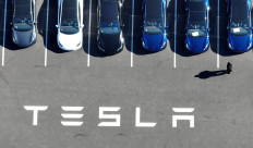 Tesla reports lower 2024 auto deliveries, missing forecast