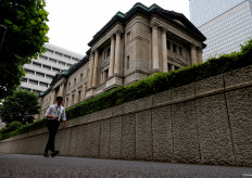 A man walks past Bank of Japan's headquarters in Tokyo on June 17, 2022.
