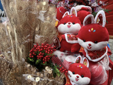 New Year celebrations: Chinese New Year ornaments featuring rabbits are displayed in Glodok Chinatown Market. (JP/Yohana Belinda)