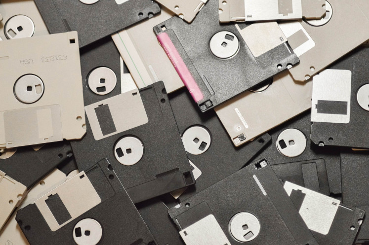 Floppy no more: In an era where people exchange data in floppy disks in the 90s, Zed and his network exchange porn through docking 5 terabyte hard drives onto each others' computers (Unsplash/SJ).jpg