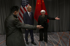 US Treasury Secretary Janet Yellen (right) greets Chinese vice-premier Liu He (center) ahead of their meeting in Zurich, on January 18, 2023.
