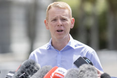 New Zealand's new Prime Minister Chris Hipkins speaks to the media outside Parliament in Wellington on Jan. 21, 2023. 