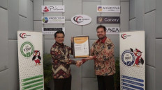 Intertek Indonesia business assurance certification and training manager Sabar Kembaren (left) and PT Integrity Indonesia managing director Edouard Helfand shake hands at the ISO 27001:2013 acceptance ceremony on Jan. 18, 2023 at Integrity Indonesia’s headquarters in Jakarta.