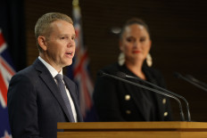 New Zealand's new Prime Minister Chris Hipkins (left) and his Depute Prime Minister Carmel Sepuloni attend their first press conference at Parliament in Wellington on Jan. 22, 2023.