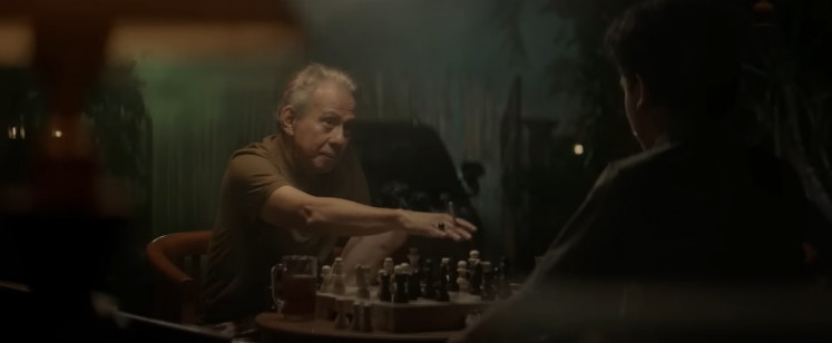 The king and the pawn: Retired general Purna (left) is seen playing a game of chess with Rakib in 'Autobiography'. (YouTube/Courtesy of KawanKawan Media).