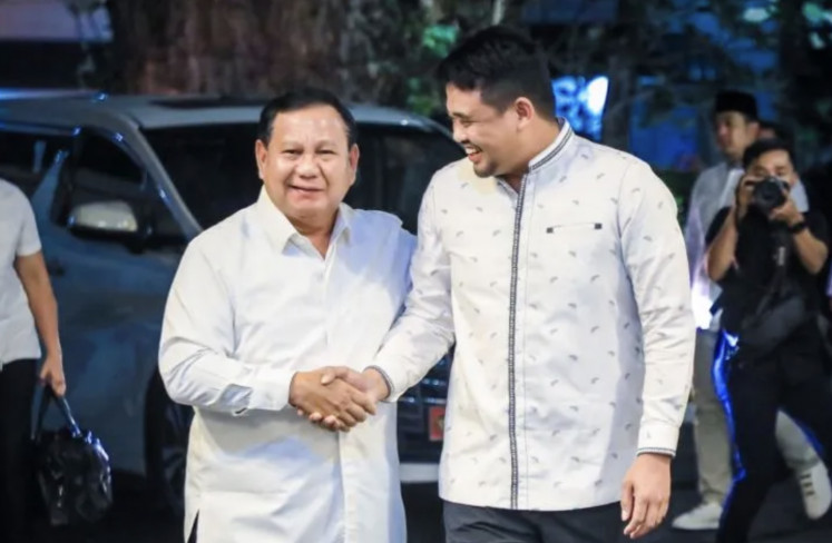 Medan, North Sumatra Mayor Bobby Nasution (left) greets Gerindra Party chairman Prabowo Subianto (left) who visited the city on January, 2023.