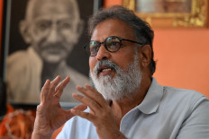 In this picture taken on January 25, 2023, Indian author Tushar Gandhi, who is the great-grandson of Mahatma Gandhi, speaks during an interview at his home in Mumbai. Tushar told AFP that Nathuram Godse's veneration was the direct result of an ideology espoused by Modi's government that risked sowing the “seeds of our destruction“.
