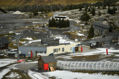 Ski lifts are stopped and parking spots are empty in La Pierre Saint-Martin ski resort, closed due to lack of snow in Arette, southwestern France, on January 13, 2023. United Nations’ Intergovernmental Panel on Climate Change report shows that human carbon emissions are heating the planet, raising the risk of floods, droughts and heat waves.