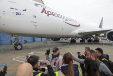 Current and former employees, customers and invited guests participate in a ceremony to mark the delivery of the last Boeing 747 aircraft, at the Boeing Future of Flight Museum in Everett, Washington, on January 31, 2023.