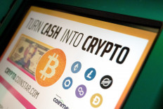 The Bitcoin logo is seen on a Coinstar cryptocurrency ATM at a grocery store in Washington, DC, on Jan. 19, 2023.