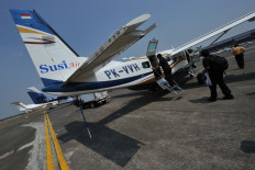 A Susi Air Cessna C208B Grand Caravan aircraft, the same model which crashed in Papua on Jan. 7, 2022, prepares for take off at Halim airport in Jakarta on Sept. 10, 2011. An airplane from the frontier airline carrier was torched by rebels and its passengers abducted after safely landing on Paro airstrip in Nduga regency, Highland Papua on Feb. 7, 2023.