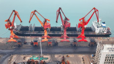 A cargo ship loaded with coal is berthed at a port in Lianyungang, in China's eastern Jiangsu province, on Nov. 28, 2022.