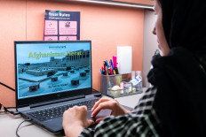 Afghan refugee and activist for women's rights Fatima Haidari gives an online virtual tour of Herat, Afghanistan, from her home in Milan, Italy, on February 7, 2023. A potential target of the Taliban, young feminist Fatima Haidari had to flee Afghanistan to find refuge in Italy. Now she organises virtual tourist tours of her country to finance clandestine courses for Afghan women deprived of an education.
