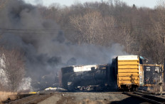Smoke rises from a derailed cargo train in East Palestine, Ohio, on February 4, 2023. The train accident sparked a massive fire and evacuation orders, officials and reports said Saturday. 
