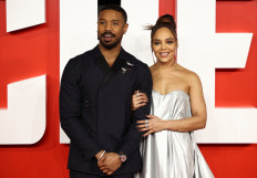 Director Michael B. Jordan and cast member Tessa Thompson attend the premiere of the film “Creed III“ in London, Britain February 15, 2023. 