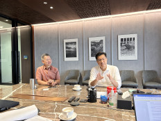 Indonesia Investment Authority (INA) former Deputy CEO Arief Budiman (right), accompanied by former investment managing director Andry Setiawan, speaks on Feb. 1, 2023, with The Jakarta Post in Jakarta.