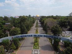 The logo of Indonesian Islamic University (UII) is seen on the arched entrance to its campus in Yogyakarta.