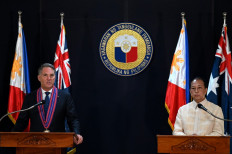 Australia Deputy Prime Minister and Defense Minister Richard Marles (left) and Philippine Secretary of Defense Carlito Galvez Jr attend a joint press conference at Camp Aguinaldo in Quezon City on February 22, 2023. 
