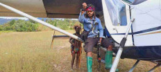Egianus Kogoya, young West Papuan rebel commander, sits on a captured plane piloted by New Zealand national Philip Mehrtens in Indonesia's Papua region in this undated picture released on Feb. 14, 2023. 