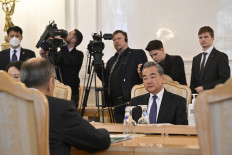 China's Director of the Office of the Central Foreign Affairs Commission Wang Yi attends a meeting with Russian Foreign Minister in Moscow on Feb. 22, 2023.