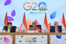 India's Finance Minister Nirmala Sitaraman (center) addresses a press conference along with the Governor of Reserve Bank of India, Shaktikanta Das (right) and Secretary, Department of Economic Affairs, Ministry of Finance Ajay Seth (left) after the G20 Finance meetings under India’s G20 Presidency in Bengaluru on February 25, 2023. 
