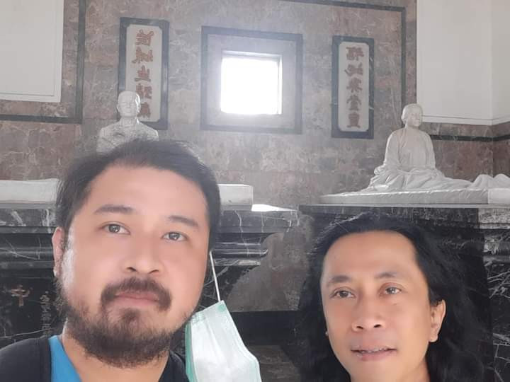 Looking for history: Tomb exploration is something Philipus (right) and Bram are doing to learn more about Chinese heritage in Indonesia. (Courtesy of Philipus Dellian Agus Raharjo)