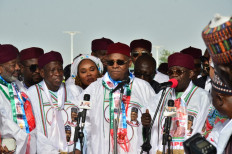 Presidential candidate of All progressives Congress party (APC) Asiwaju Bola Ahmed Tinubu (2nd right) speaks at the party rally in Maiduguri on February 18, 2023 ahead of the Nigerian presidential elections scheduled for February 25, 2023. 
