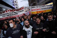 Protesters take part in a demonstration in front of Hellenic Train headquarters after a crash, where two trains collided near the city of Larissa, in Athens, Greece, March 1, 2023. 