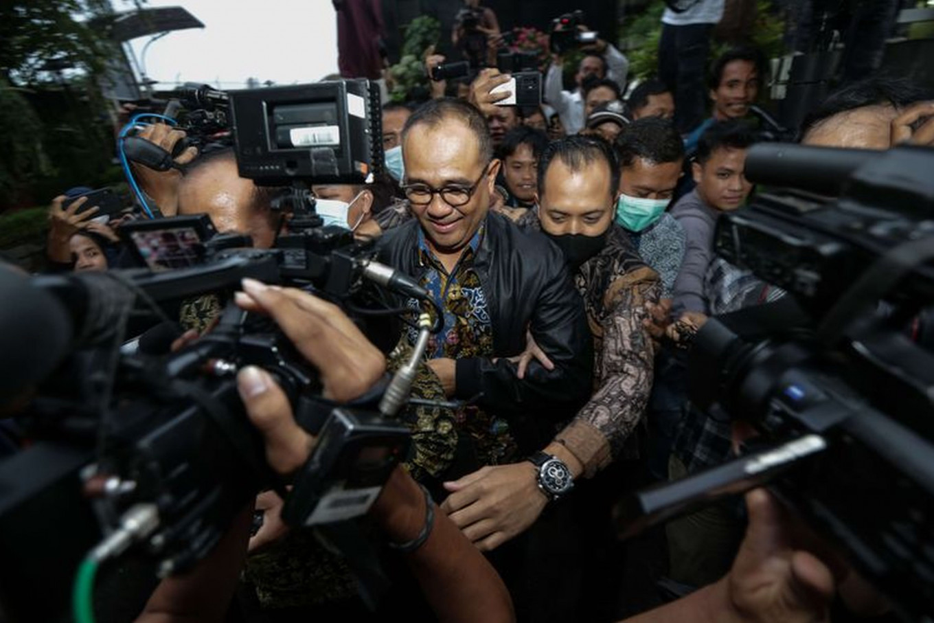 Tax officer Rafael Alun Trisambodo (center) is surrounded by the media as he leaves the Corruption Eradication Commission (KPK) building in South Jakarta on March 1, after complying with the KPK’s summons to clarify his wealth.