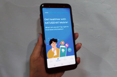 A general view of SatuSehat (one health) mobile app, a facelift of the government's COVID-19 testing and tracing app PeduliLindungi, photographed on March 3, 2023.