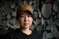 Chinese tattoo artist tells women's stories through ink 