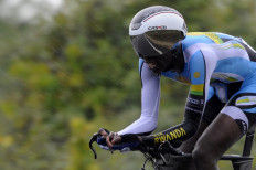Rwanda's Jean Bosco Nsengimana competes in the men's Under 23 individual time trial at the 2014 UCI Road World Championships in Ponferrada on September 22, 2014.
