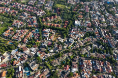 Rising population: A residential area near the city center of Jakarta is seen in this aerial photo taken on Dec. 2, 2021. 