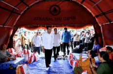 President Joko “Jokowi“ Widodo visited survivors  of fuel tank explosions in temporary shelters in Plumpang, North Jakarta on March 5, 2023.