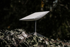 This photograph taken on September 25, 2022, shows an antenna of the Starlink satellite-based broadband system donated by American tech billionaire Elon Musk in Izyum, Kharkiv region, amid the Russian invasion of Ukraine.
