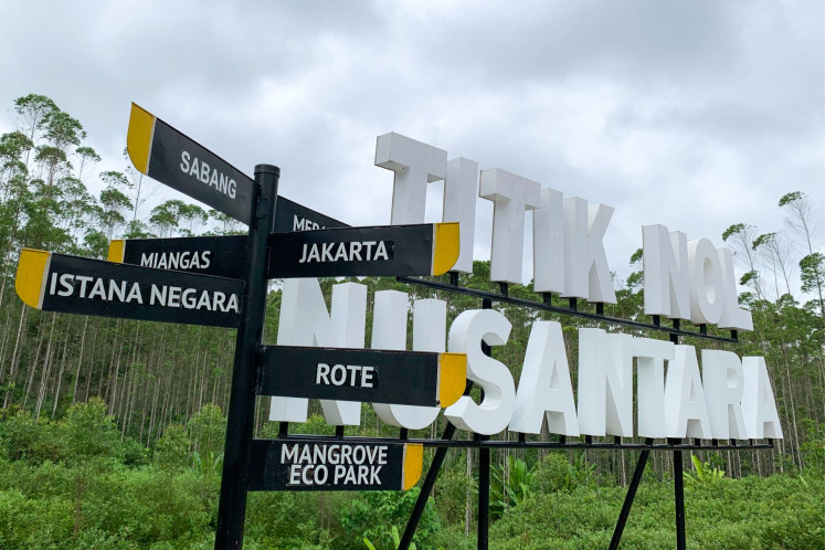 A sign at Ground Zero Nusantara, the planned future capital of Indonesia, shows the directions of various cities, in Sepaku, North Penajam Paser, East Kalimantan, on Aug. 14, 2022. 