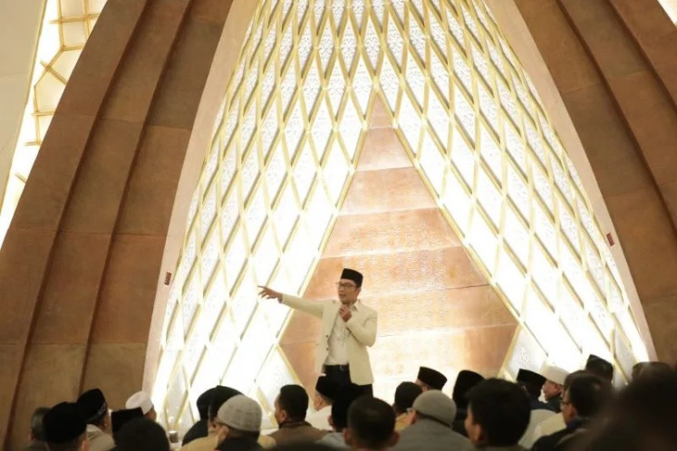 Then-West Java governor Ridwan Kamil speaks in front of civil servants as they gather for dawn prayers at Al Jabbar Grand Mosque in Gedebage, Bandung, on Dec. 30, 2022. 