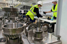 Stellantis employees work on the e-DCT electrified automatic vehicle transmission assembly line at the carmaker Stellantis factory in Metz, France, June 29, 2022. 