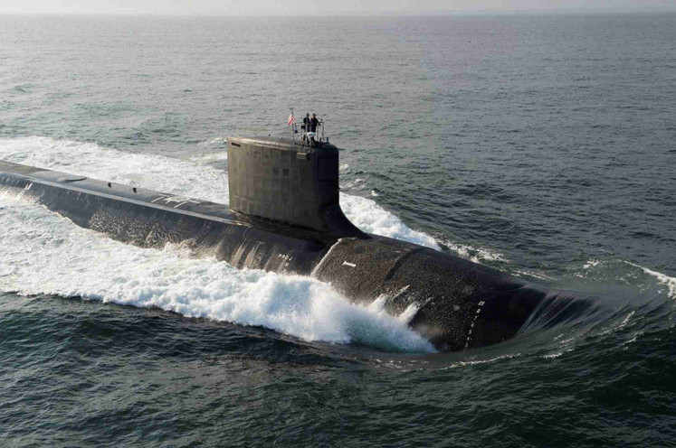 The Virginia-class USS North Dakota (SSN 784) submarine is seen during bravo sea trials in this U.S. Navy handout picture taken in the Atlantic Ocean August 18, 2013. The Navy commissioned its newest attack submarine North Dakota, during a ceremony October 25, 2014, at Submarine Base New London in Groton, Connecticut, defense officials announced.